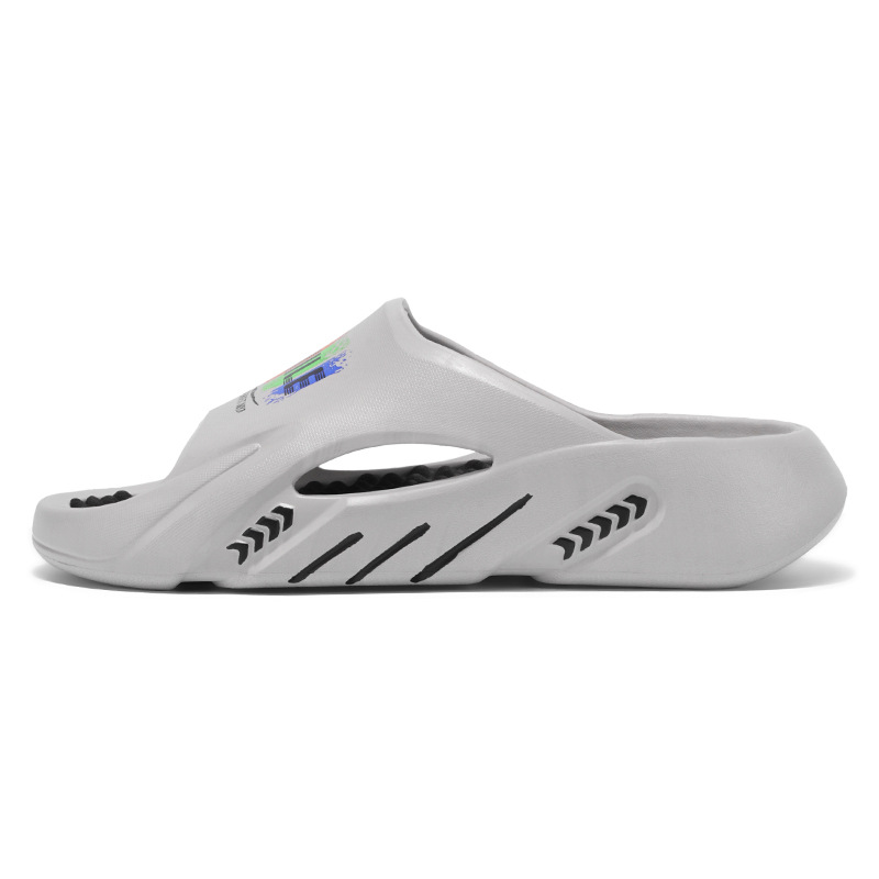 Red celebridad en vivo de verano masaje fondo de dos colores EVA zapatillas frías usar una zapatilla transfronteriza zapatillas grandes para hombres y mujeres