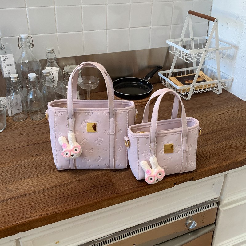 Borsa a secchiello in rilievo donna, elegante borsa a tracolla_voghion.com