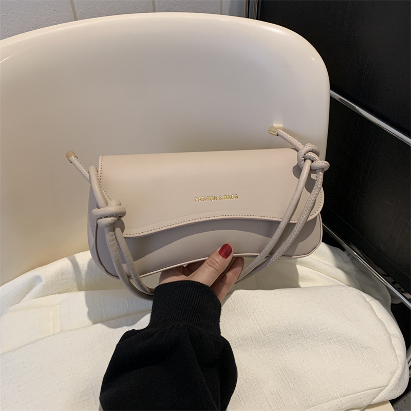 Bolso de diseño de nicho para mujeres 2024 verano nueva moda moda popular mochila de hombro bolso de hombro de viaje casual bolso de brazo