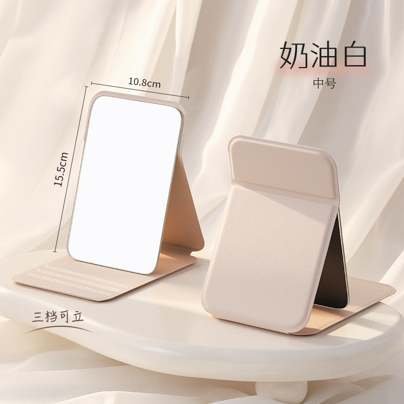 Espejo de maquillaje portátil de viaje de mujer plegable pequeño espejo de mano dormitorio de estudiantes espejo plegable mini espejo para hombre