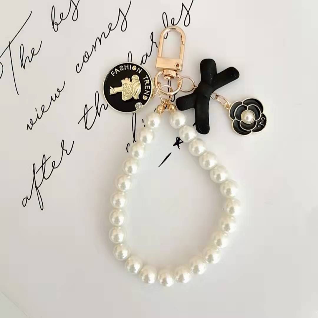 Japón y Corea del Sur color ins hecho a mano con cuentas flor llavero cordón de muñeca macaron color pétalo cordón de teléfono móvil en stock