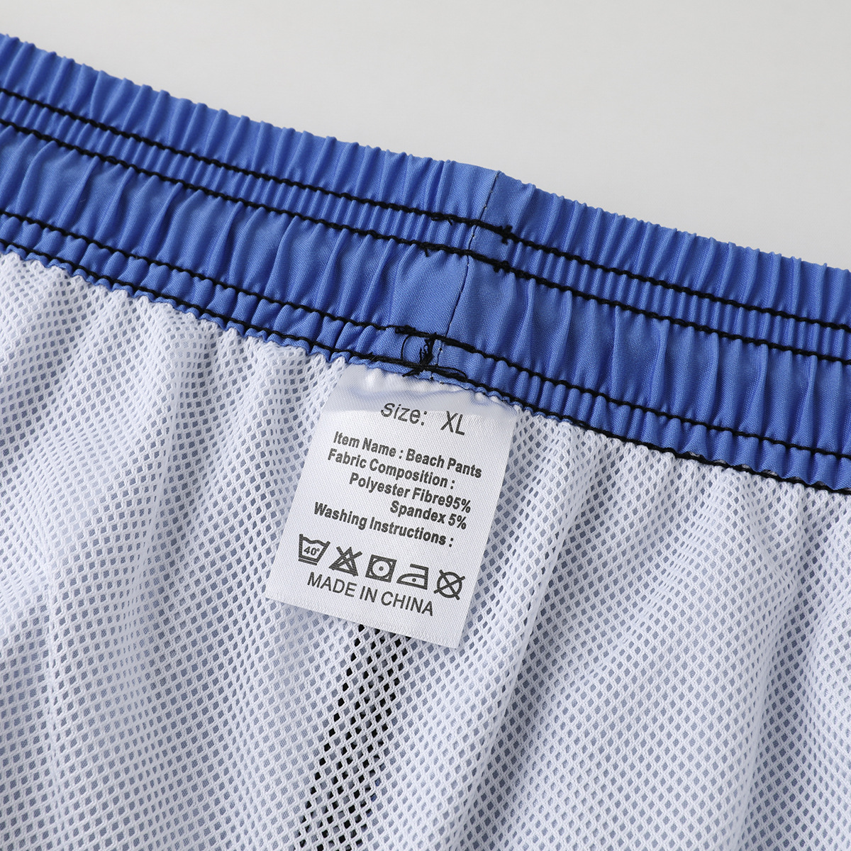 Pantalones cortos de doble capa de malla de triángulo anti-vergonzamiento vacaciones de playa secado rápido pantalones cortos deportivos de ocio transpirables para hombres de playa