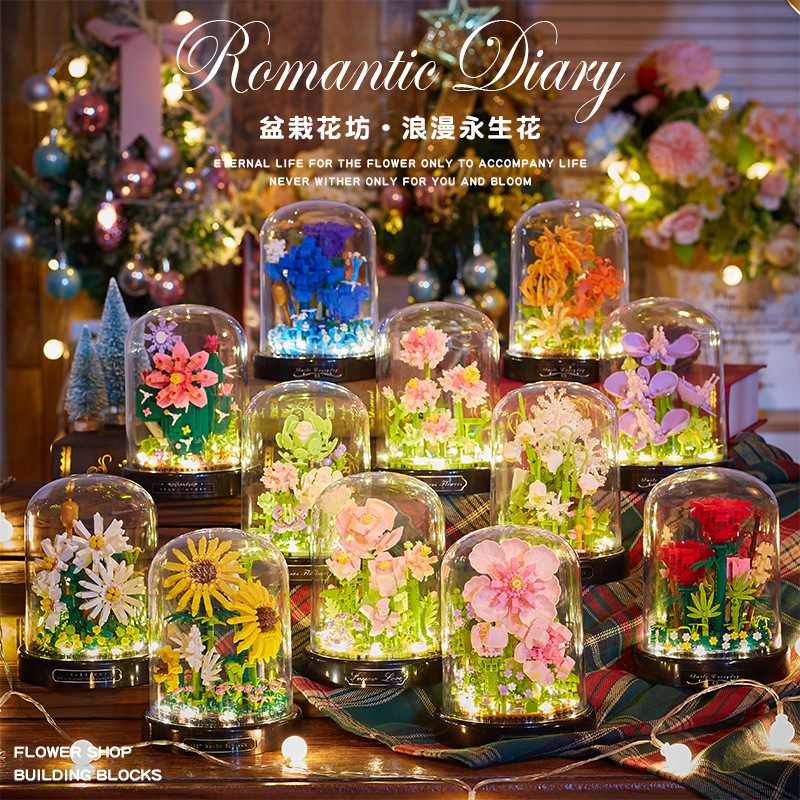 積み木の花がバラのオルゴールを飾っています。|undefined