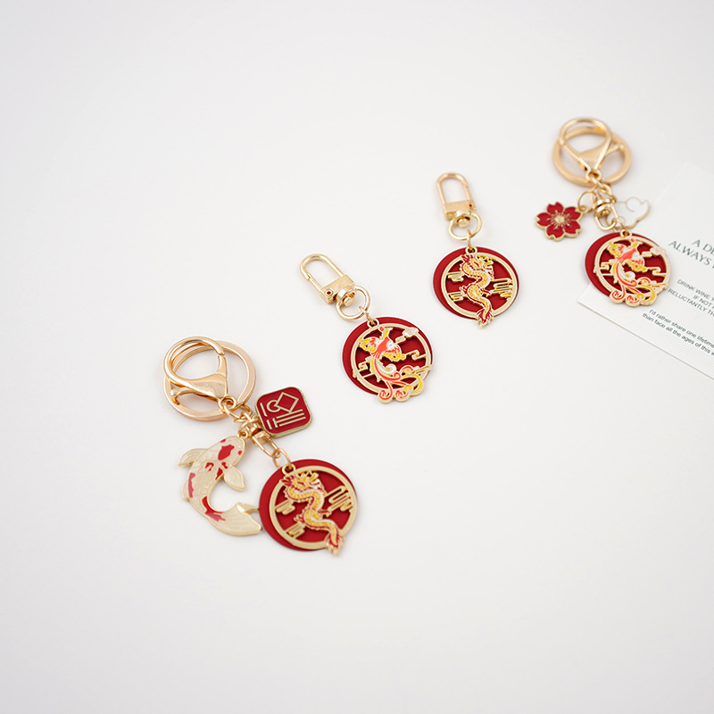 Tianyun Tengfei Dragon y Phoenix año llavero creativo lindo hombres y mujeres coche llavero aleación exquisita joyería en línea celebridad colgante