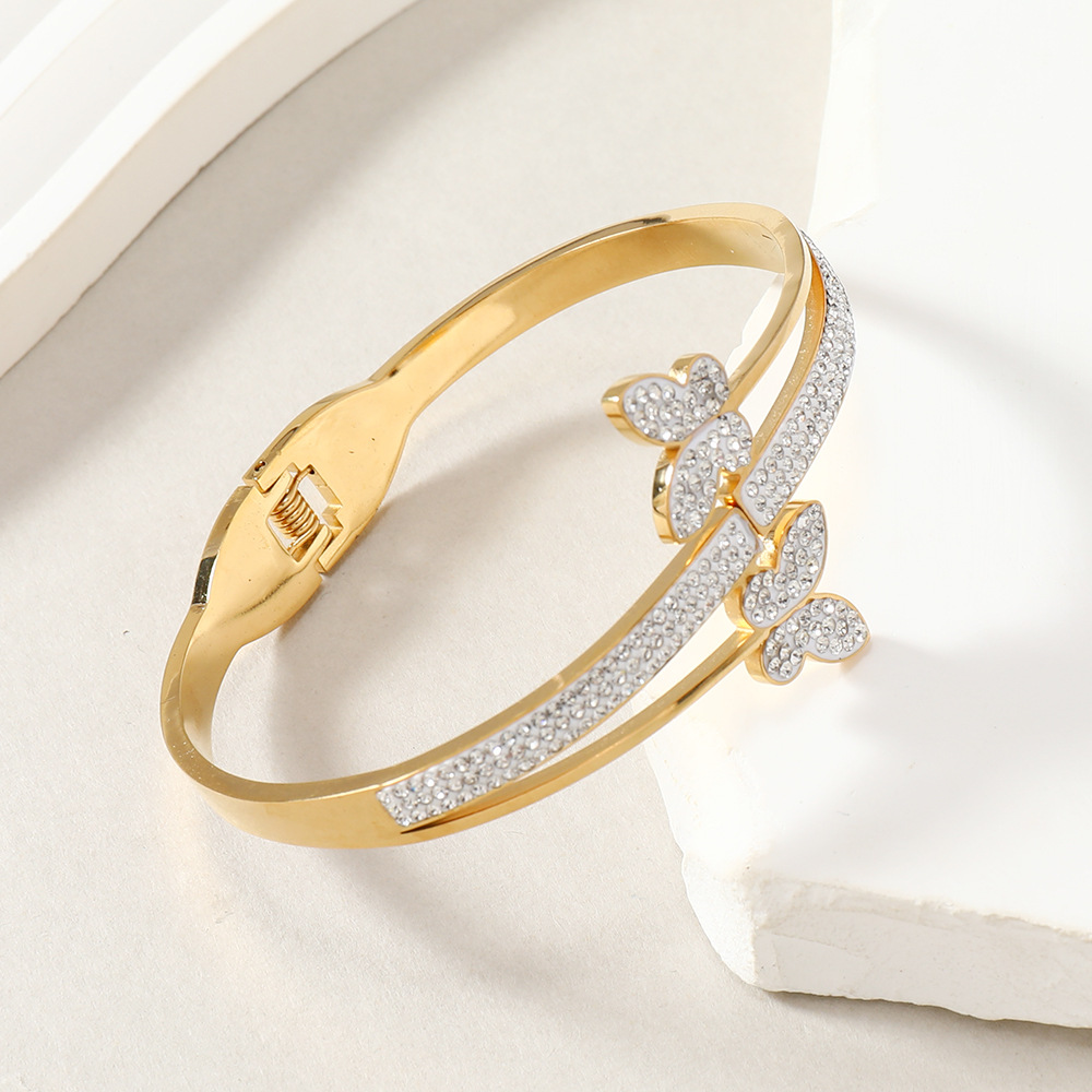 Pulsera de hebilla de acero de titanio de moda para todos los partidos pulsera de diamantes de mariposa de alto grado para mujer pulsera de acero inoxidable de lujo ligero fabricante