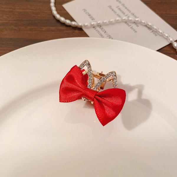 With bow, red