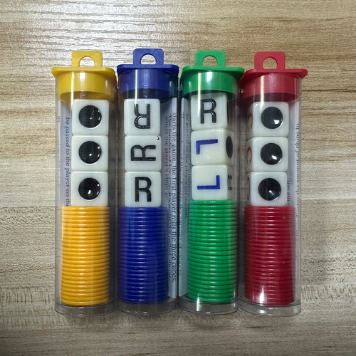 Cross-border hot selling left, center and right fun four-color game dice LCR game dice with chips in tube English version