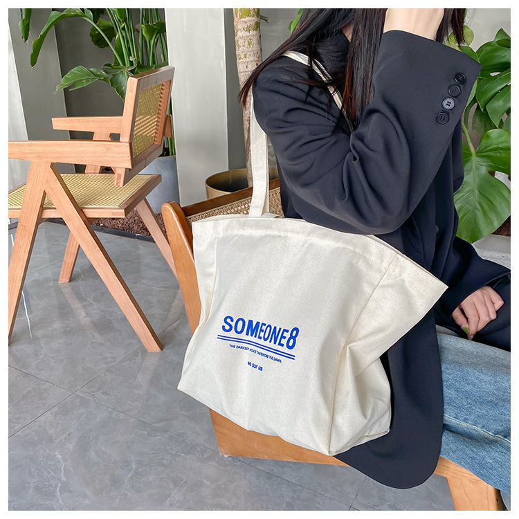 A large-capacity, sturdy Japanese-style canvas bag for women, a new 2022 simple bento handbag for girls to go to work undefined