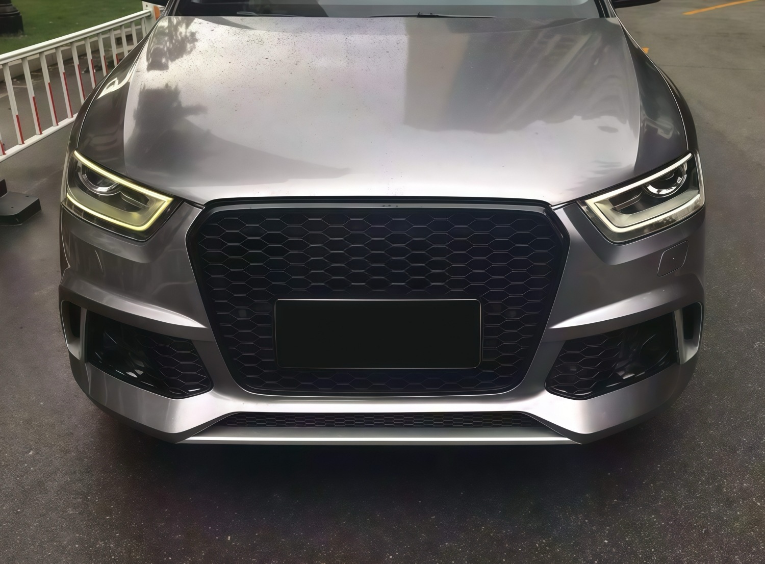 Suitable for Audi Q3 models from 2012-2015, this is an RS Q3-style front bumper, front grille, and front fascia kit