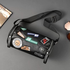 トレンディなブランドの新しい小さなバッグクロスボディバッグメンズトレンディなブランドメンズ小さなバックパックイン日本の男の子ニッチシリンダーショルダーバッグ