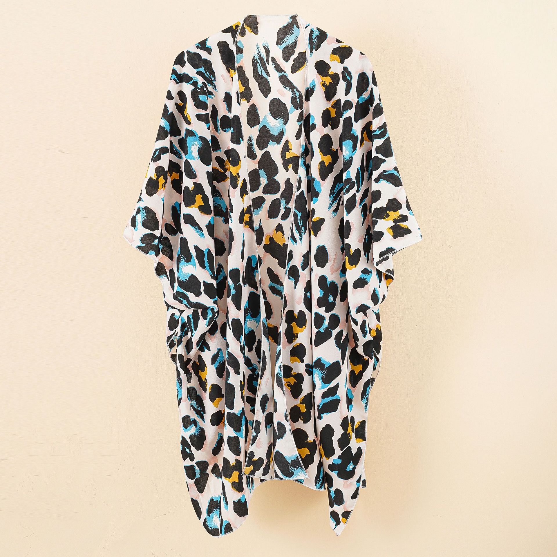 Cárdigan de longitud media con estampado de leopardo para mujer, estilo europeo y americano, sexy, para la playa, ropa de protección solar.