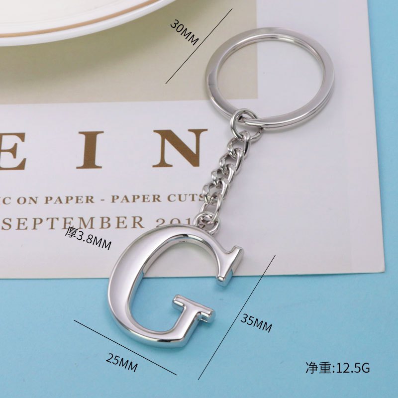 Inglés carta llavero bolsa colgante 26 letras mayúsculas y minúsculas y números llavero europeo y americano pequeño regalo personalización