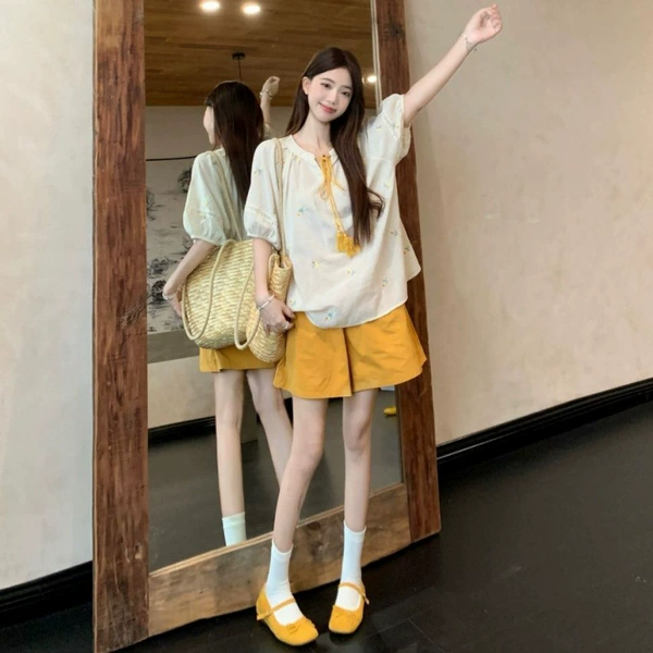 Yellow shorts, flowered