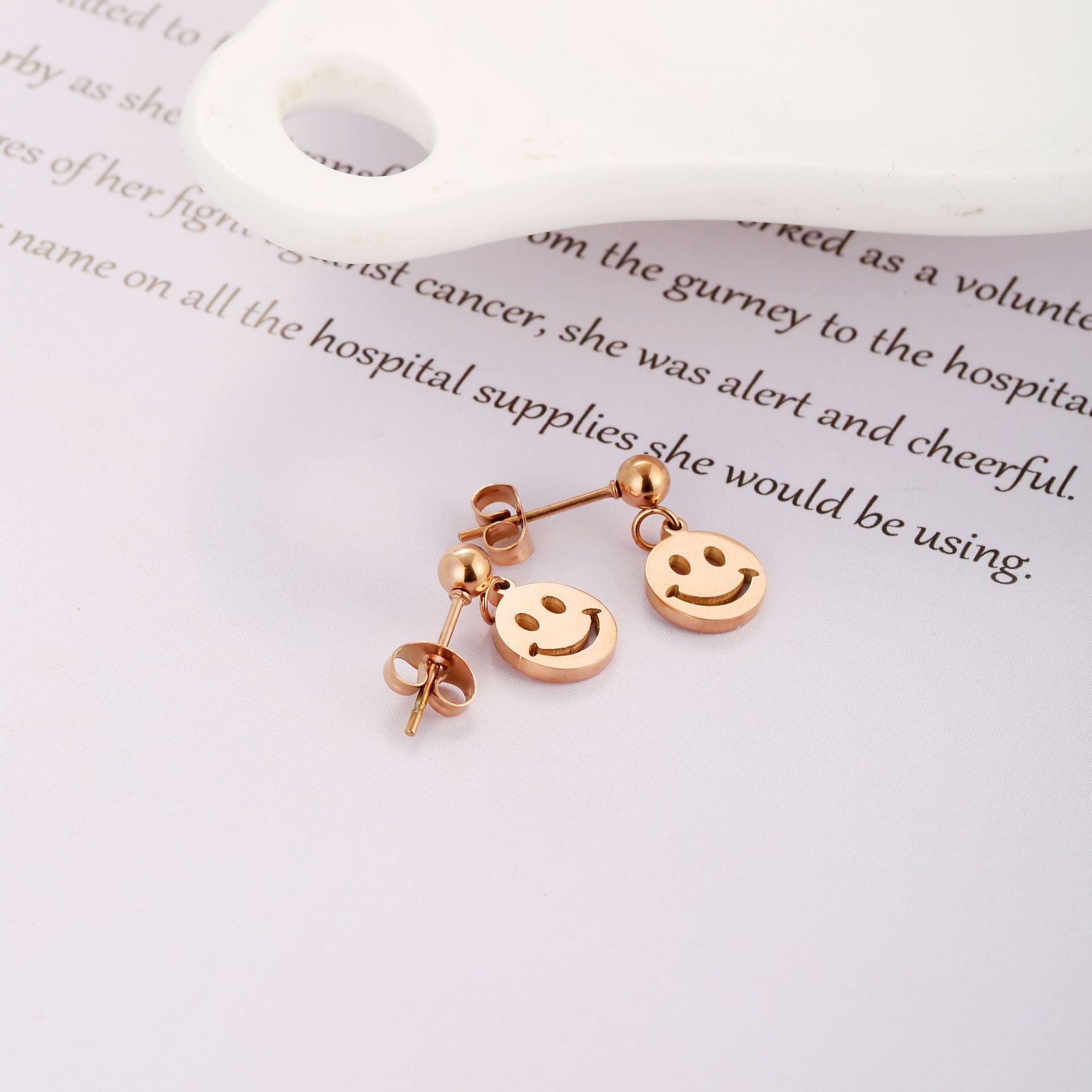 European And American Elegant Clover Smiley Face Round Beads Titanium Steel Ear Studs Suit Women's Simple Fashion Ins Earrings Rose Gold display picture 4