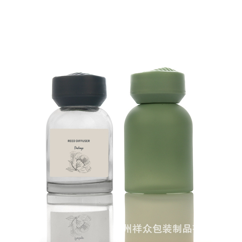 Botella de fragancia de vidrio cilíndrico verde, botella de fragancia vacía sin fuego, botella de fragancia