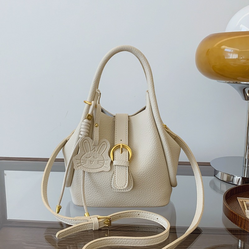 Bolsas de mujer tendencia de hombro solo para trabajar bolsas coreanas de cubo sensación de bolsas de viaje de moda nueva bolsa interior para mujeres