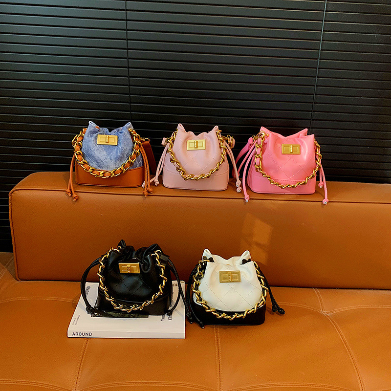 Bolsa de mano de cadena coreana para chicas pequeñas bolsas de cubo mini compactas nuevas bolsas de comercio exterior transfronterizas para niños