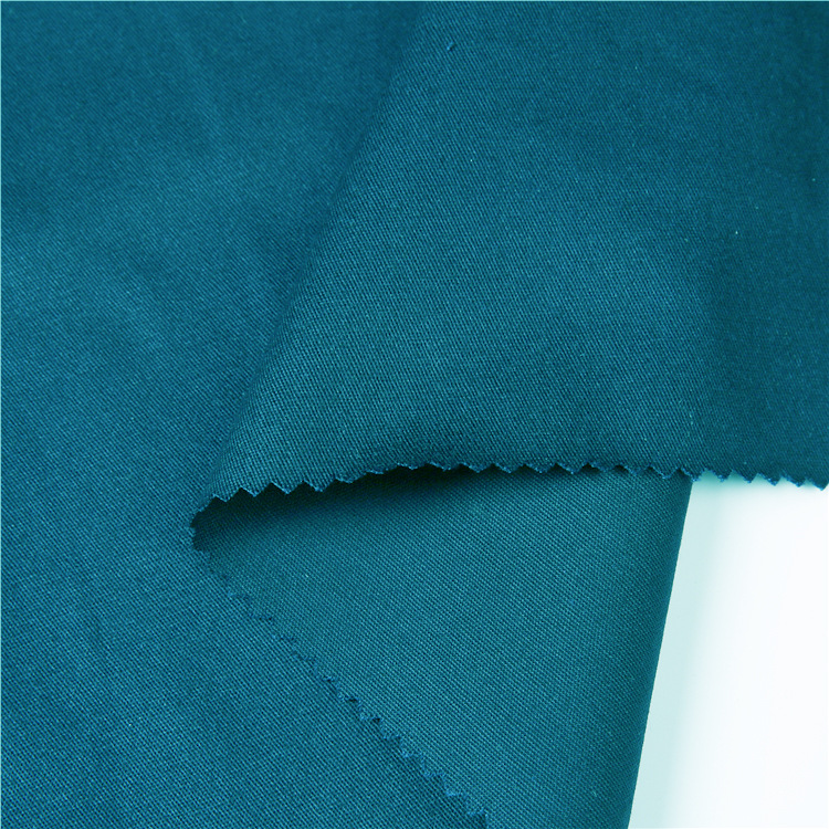 Fabrica de algodón orgánico de China tela de algodón spandex tela de pantalones