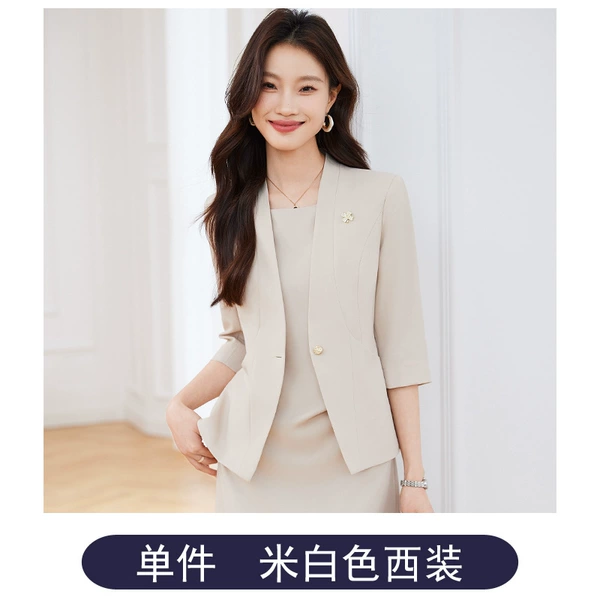 Single piece off-white suit
