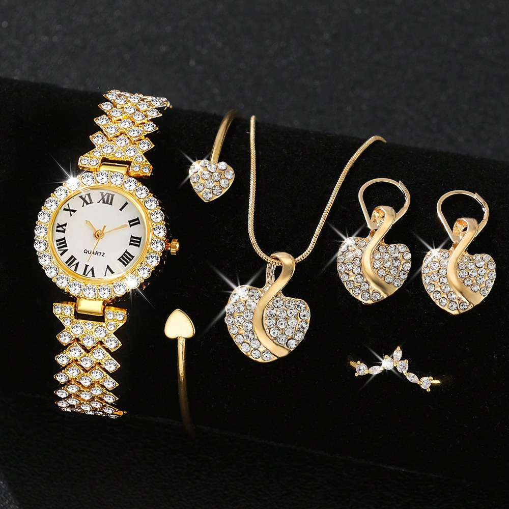 Gold + diamond bracelet + diamond necklace earrings ring