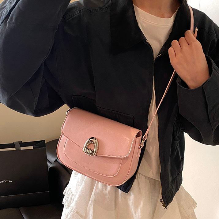 Simple bolso de silla de ocio retro mujer 2025 nuevo estilo extranjero bolso de hombro universal de moda bolso de mochila