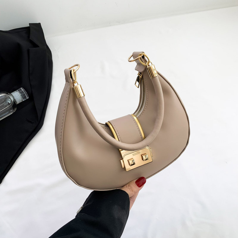 Bolso de axila simple y moderno 2024 nuevo diseño de nicho, estilo explosivo transfronterizo, bolso de luna nueva de un solo hombro de todo fósforo