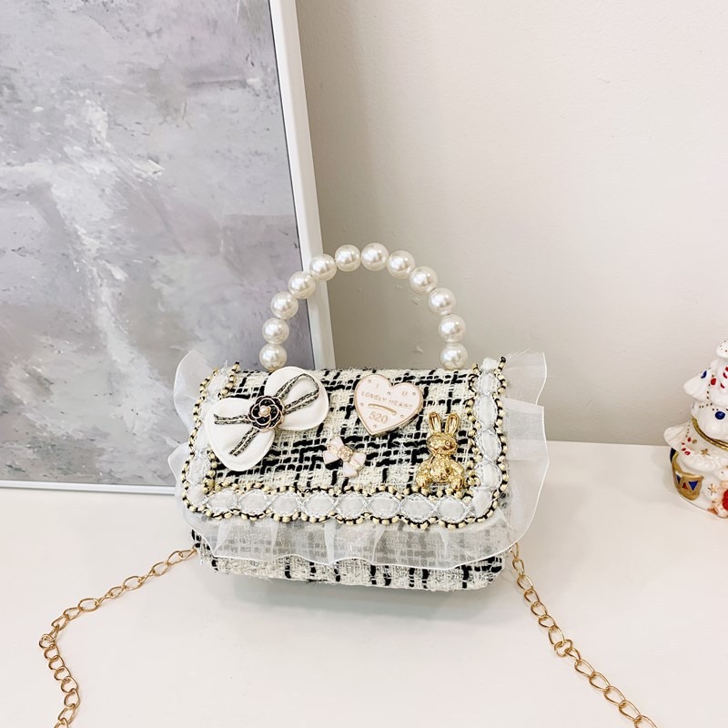 2025 nuevo estilo coreano de viento de fragancia mini niñas princesa de perlas portátil hombro único accesorios bolsos para niñas