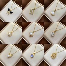 爱心钛钢项链女2023年新款潮轻奢裙子锁骨链小众设计感蝴蝶铜吊坠