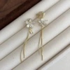 Golden ear clips, no pierced ears