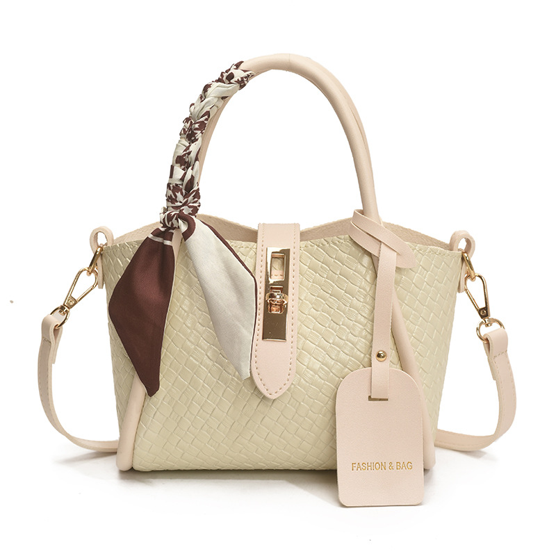 Bolsos Bolsos de moda femenina Bolsos de cubo de canasta de verduras 2025 nuevo bolso de hombro salvaje bolso de mensajero tejido extranjero