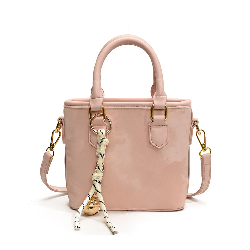 Bolso de mano popular ultra caliente para mujeres 2025 nuevo estilo versátil bolso de hombro casual simple de alto nivel nicho bolso de cubo