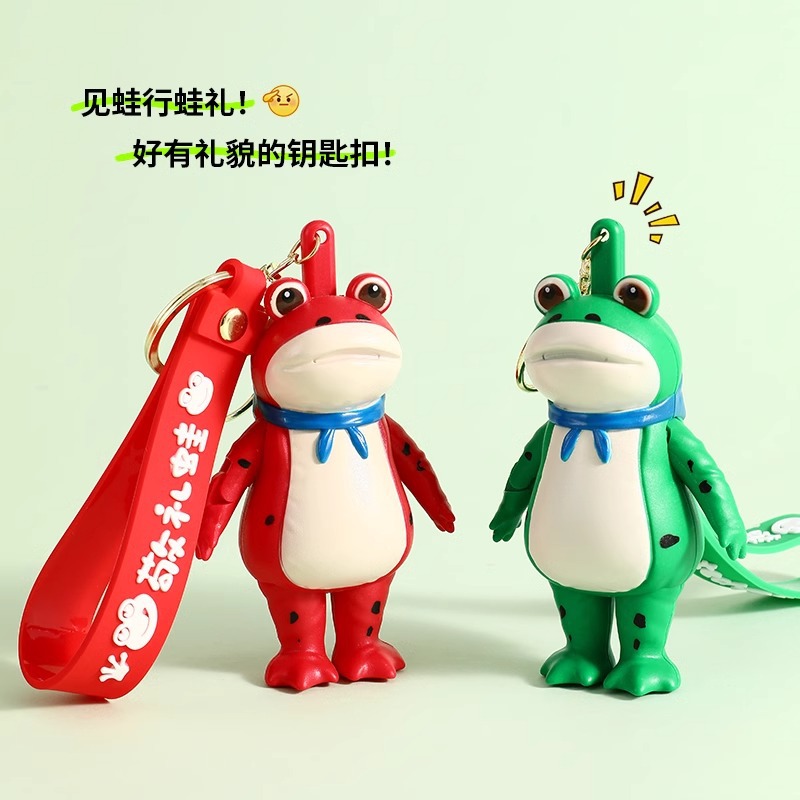 Saludo explosivo rana llavero de automóvil adorable pareja colgante en línea rana muñeca colgante regalos al por mayor