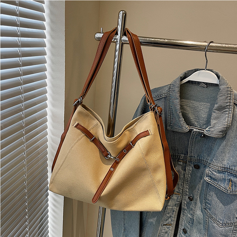 Bolsa de hombro de denim para mujeres 2025 primavera retro alta sensación bolso de hombro de gran capacidad tote bag de viaje