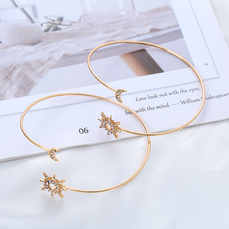 Stylish Metal Bangle - Stars and Moon Design