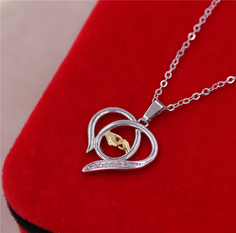 Nihaojewelry Fashion Big Hand Holding Small Hand Heart-shaped Necklace Wholesale Jewelry display picture 2