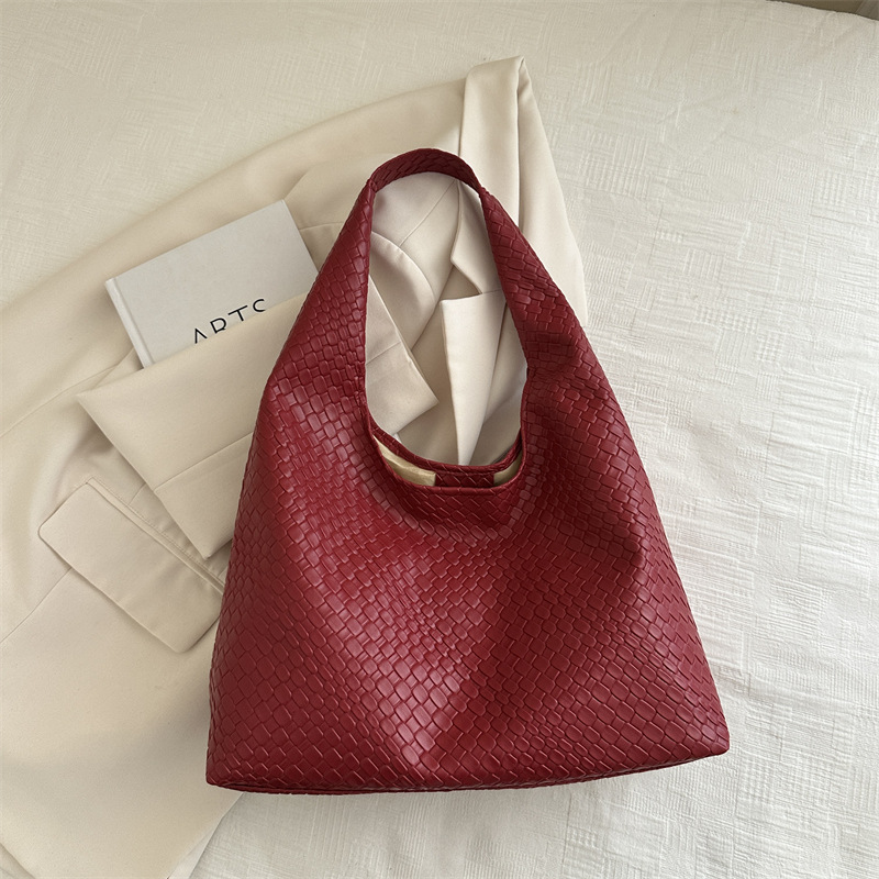 Otoño y invierno retro bolsos de dos piezas 2024, bolsos de moda de mujer, bolsos de hombro portátiles extranjeros, bolsos simples.