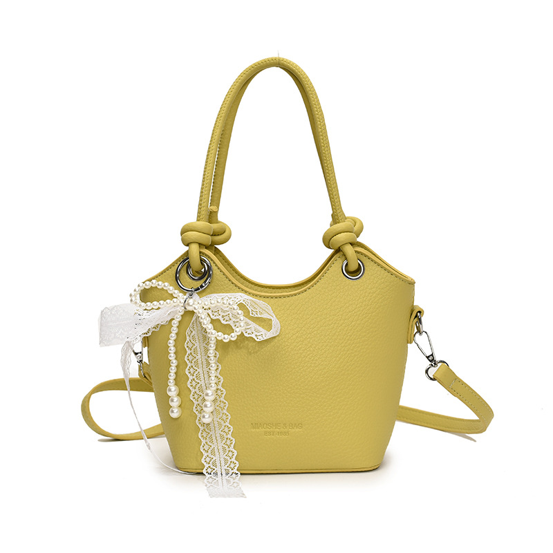 Bolso de cubo popular de este año para mujer 2025 nuevo bolso de mensajero de nicho de alta gama bolso de hombro de viajero súper caliente