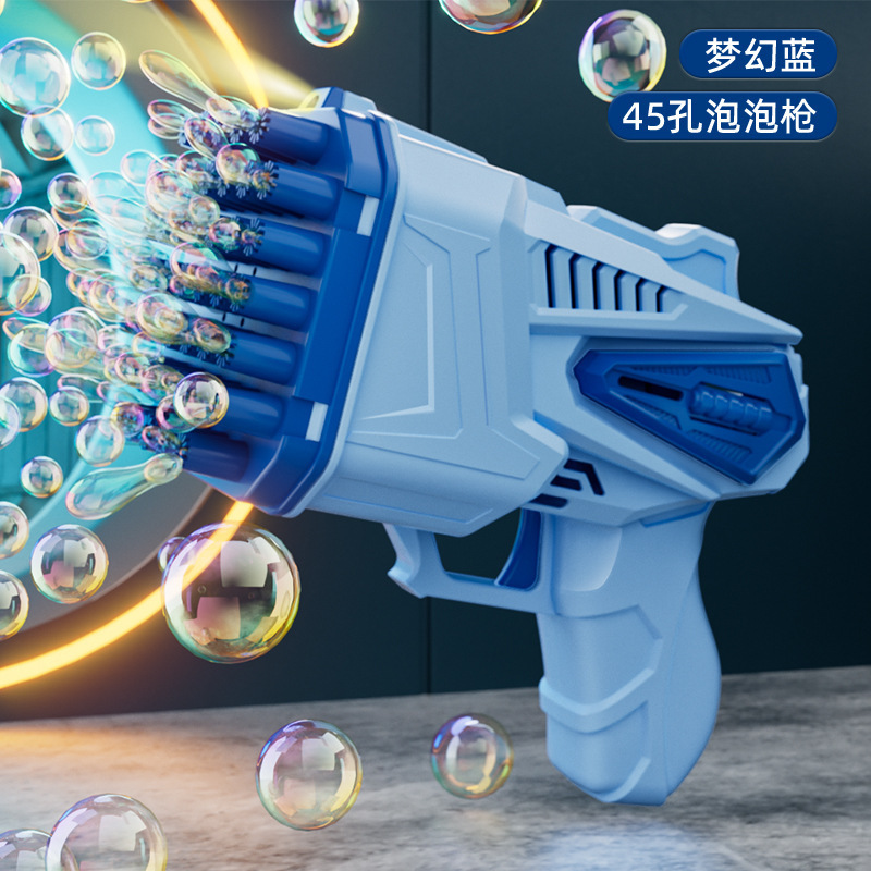 バブルマシンのネットレッドの爆発的な子供はバブルガンのガトリング発光を持ってバブルマシンの卸売りを吹いておもちゃを並べます。|undefined