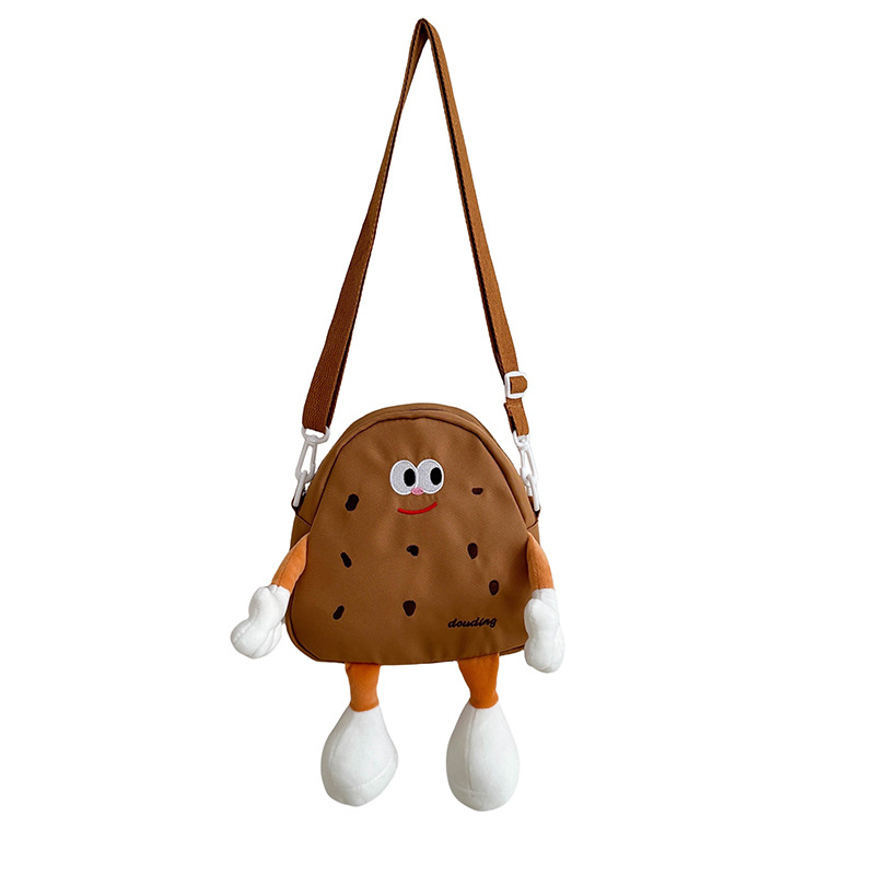 Bolsos de hombro de dibujos animados japoneses para niños y niñas lindos y interesantes pequeñas galletas bebés mochila 2025 nuevo tipo de bolsos para niños