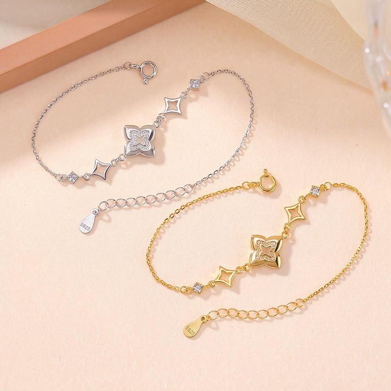 Lắc tay nữ bạc S925 mạ vàng hình cỏ bốn lá nhẹ thời trang — Loại bạc