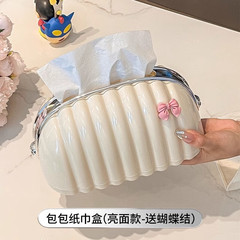クリーム風の貝殻はティッシュの箱を包みます。