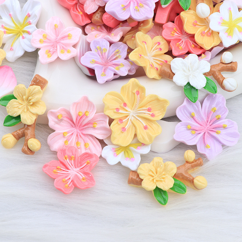 Nuevos accesorios de bricolaje de flor de durazno de resina rosa, zapatos con agujeros de pegamento de crema, fundas para teléfonos móviles, accesorios para el cabello, material de imán para refrigerador al por mayor