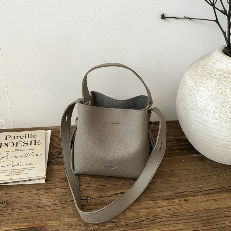 Bolsa de cubo de mano coreana 2026 nuevo nicho diario bolso de cubo bolso de mujer gran capacidad de transporte de viaje mochila