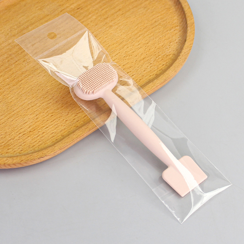 Horizontal shovel-head facial cleansing brush: skin tone