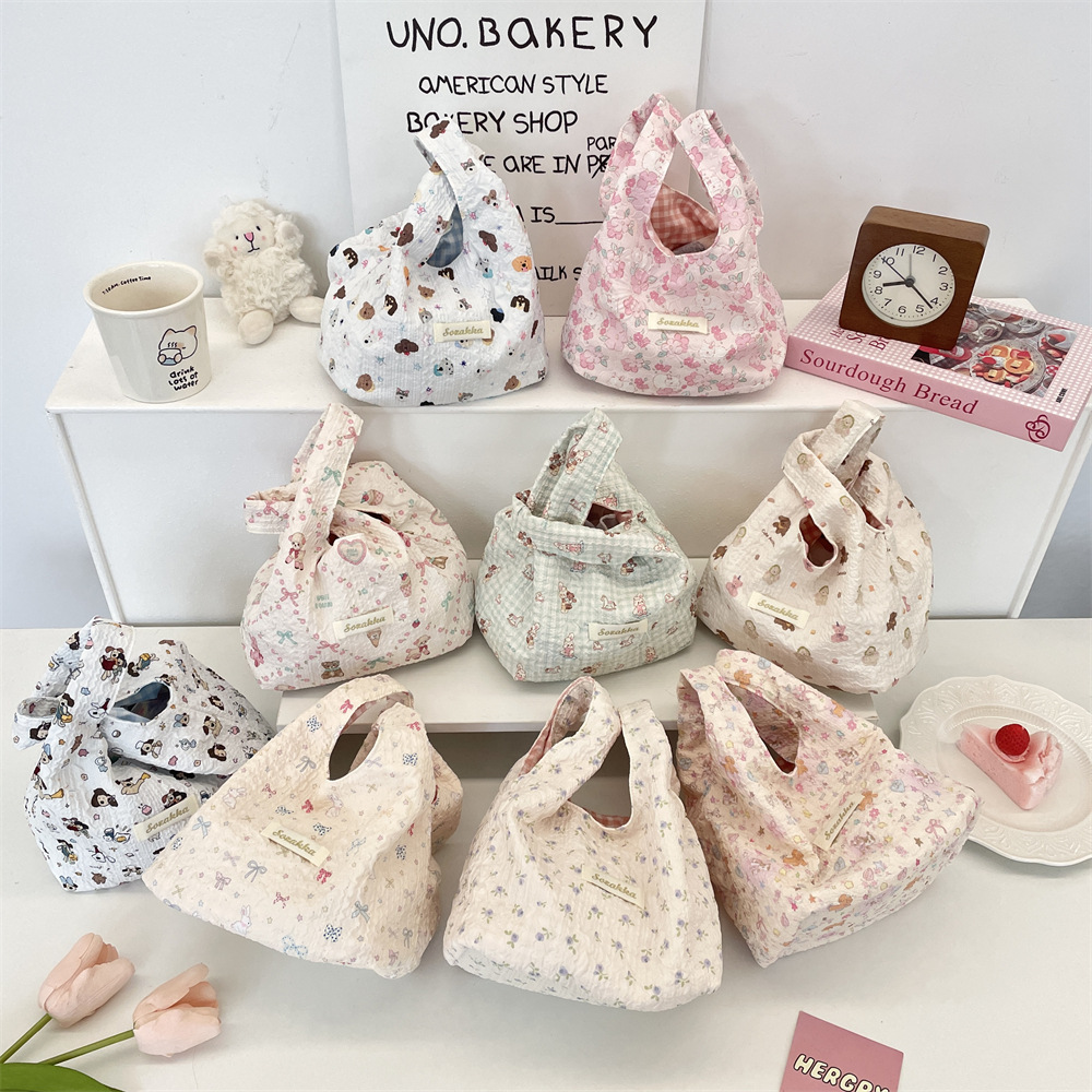 510101 卡通压花手腕包大容量上班族饭盒袋杂物手提袋整理手拎包