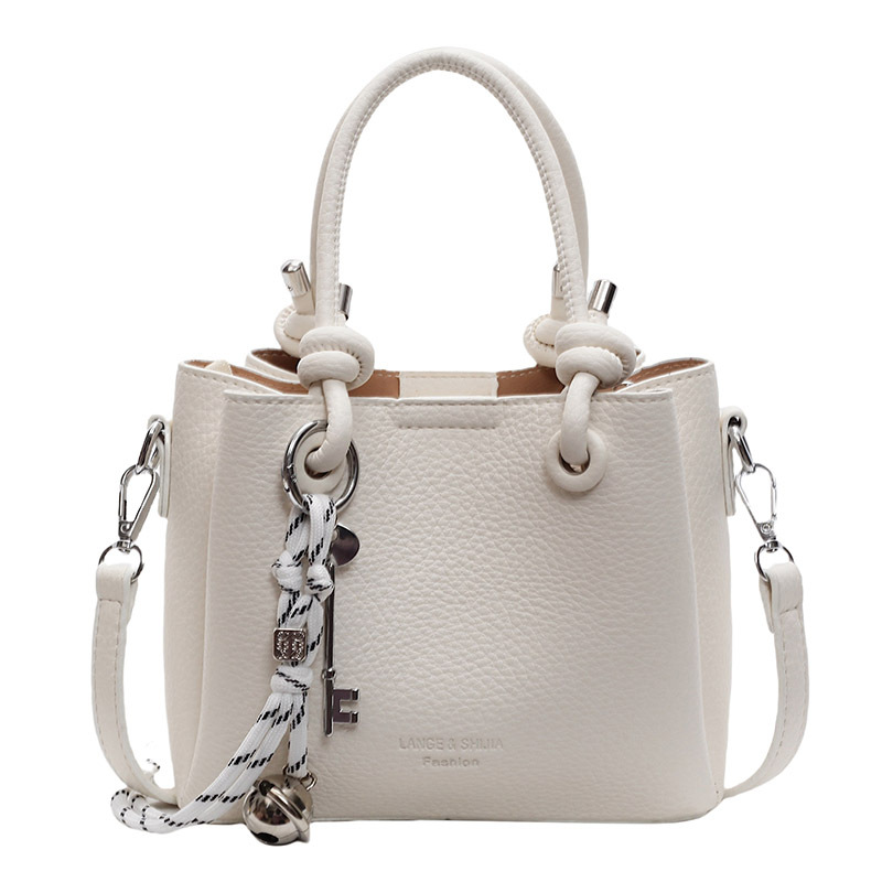 Simple bolso de cubo de mano extranjero 2025 nuevo bolso de mujer, bolso de hombro casual, sensación de alto nivel, bolso de mochila super caliente