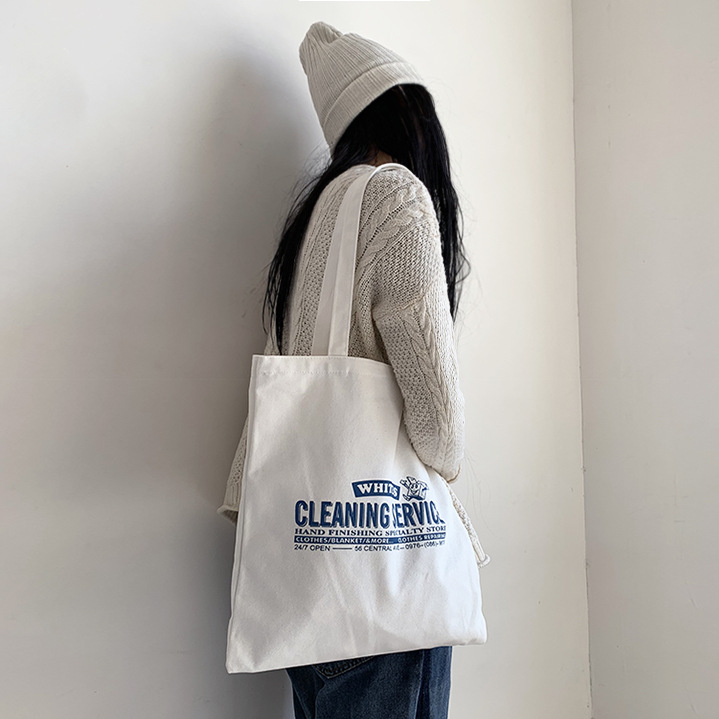 Nuevo ins bolsa de lona de un hombro de moda estilo coreano artístico simple carta estudiante bolsa de compras de lona para hombres y mujeres