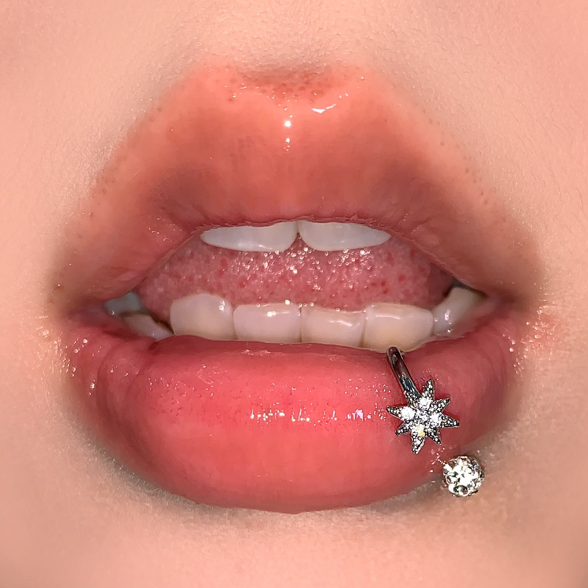Silver pointed spike labret stud material detail