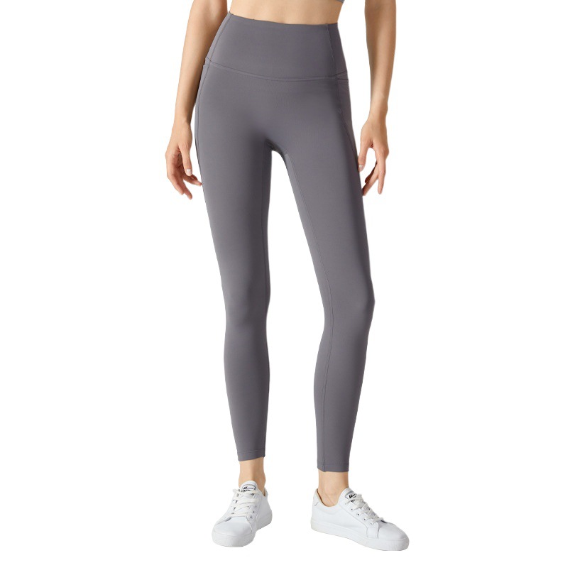 Europa y América más terciopelo yoga Otoño e Invierno pantalones de yoga cintura alta vientre contracción medias deportivas cálidas pantalones de bolsillo lateral de las mujeres