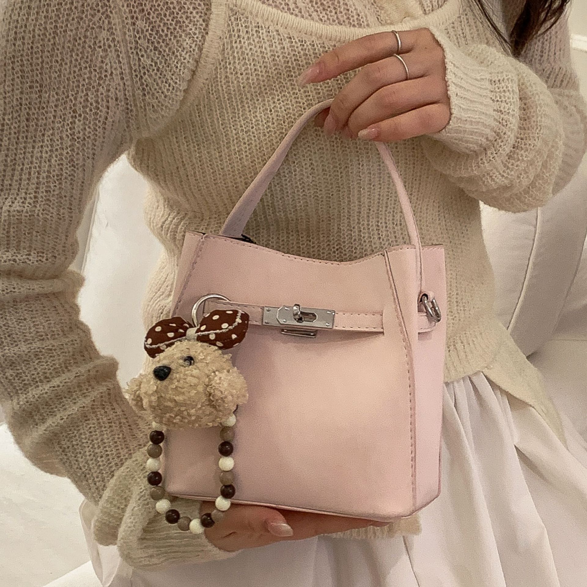 Cross-border 2026 nuevo estilo coreano nicho Zhong bolso de cubo de agua super caliente mujer de viaje universal temperamento casual mochila diaria